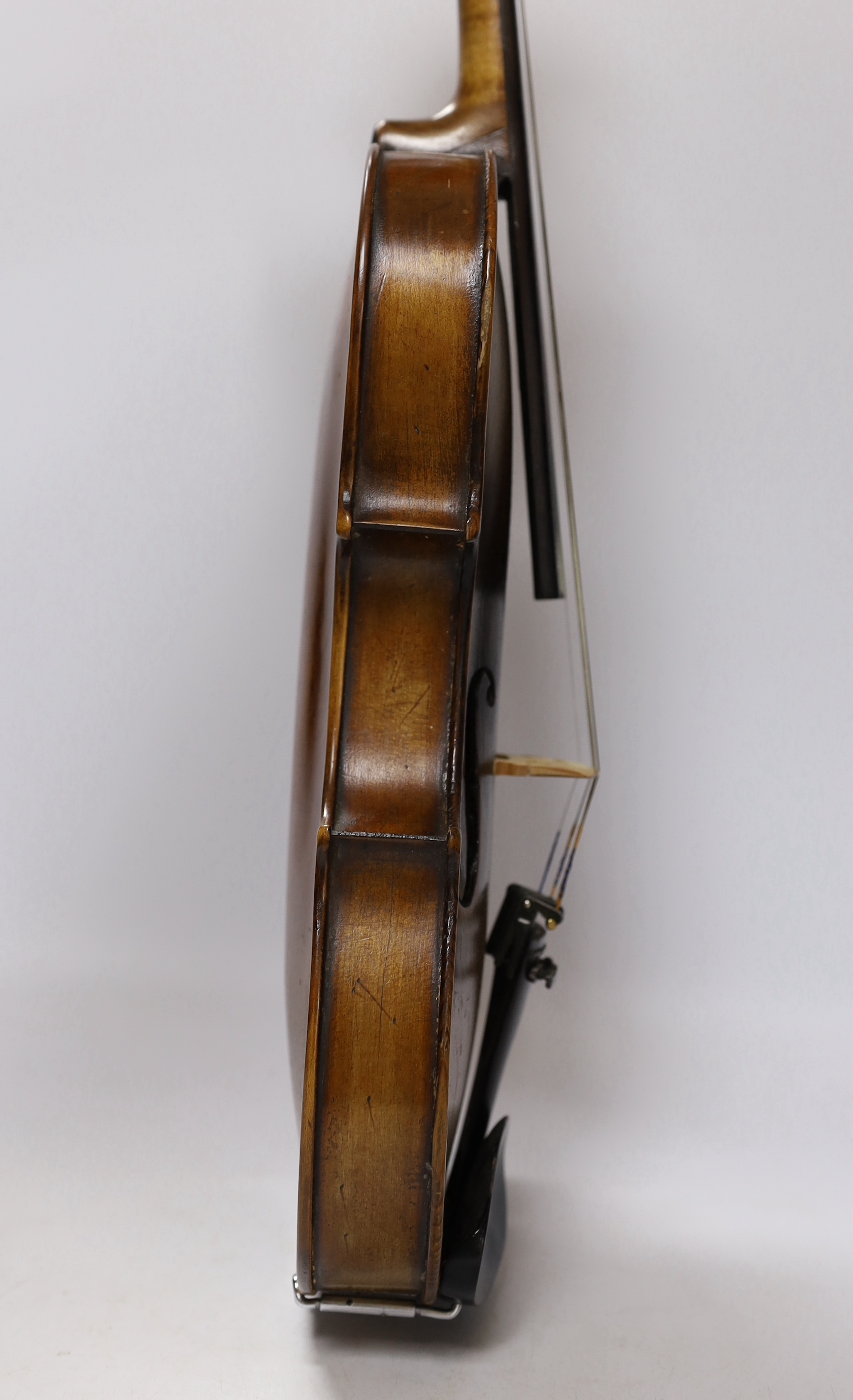 An early 20th century English violin stamped Norman Duke, London, one piece back with wax seal, cased, violin 60cm long